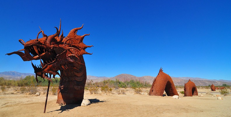 Image: dragon in desert sand