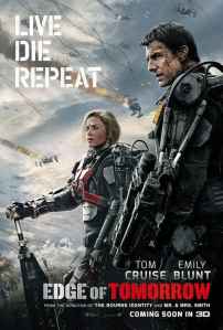 Emily Blunt and Tom Cruise stand in futuristic robotic battle armour, their faces grimy and bloodied, as drone ships fall from the sky in flames above them. The tagline reads "Live Die Repeat". Promotional poster for the 2014 sci-fi action film Edge of Tomorrow.
